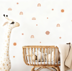 cosmic cuties kids wall decals with planets, suns, clouds and rainbows in a cozy nursery corner
